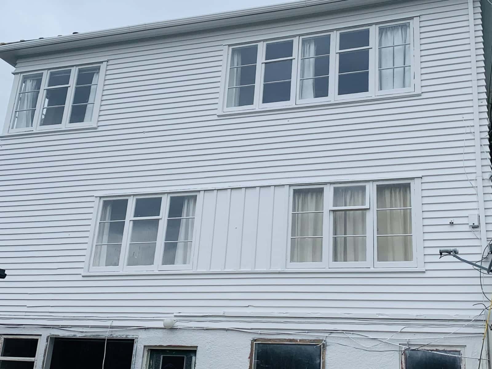 Two-storey strip and repaint: after